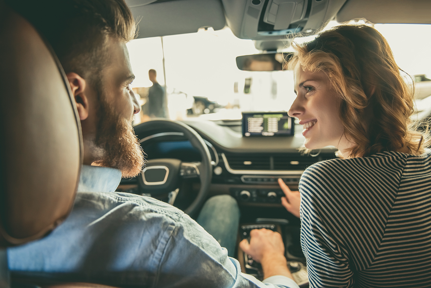 Couple test drives a car