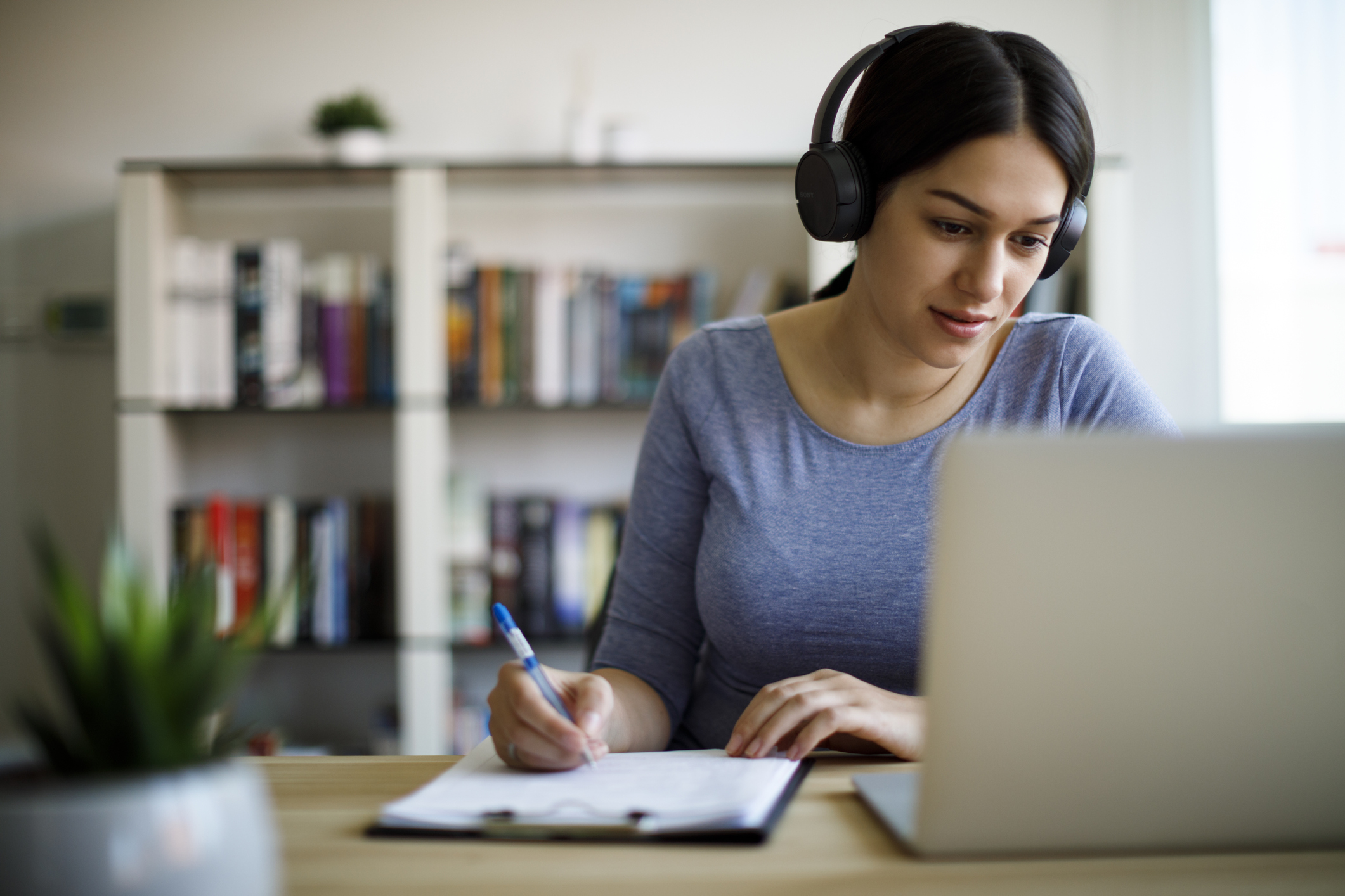 Woman reviewing finances with Elements