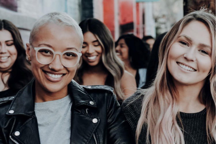 Women looking right into the camera
